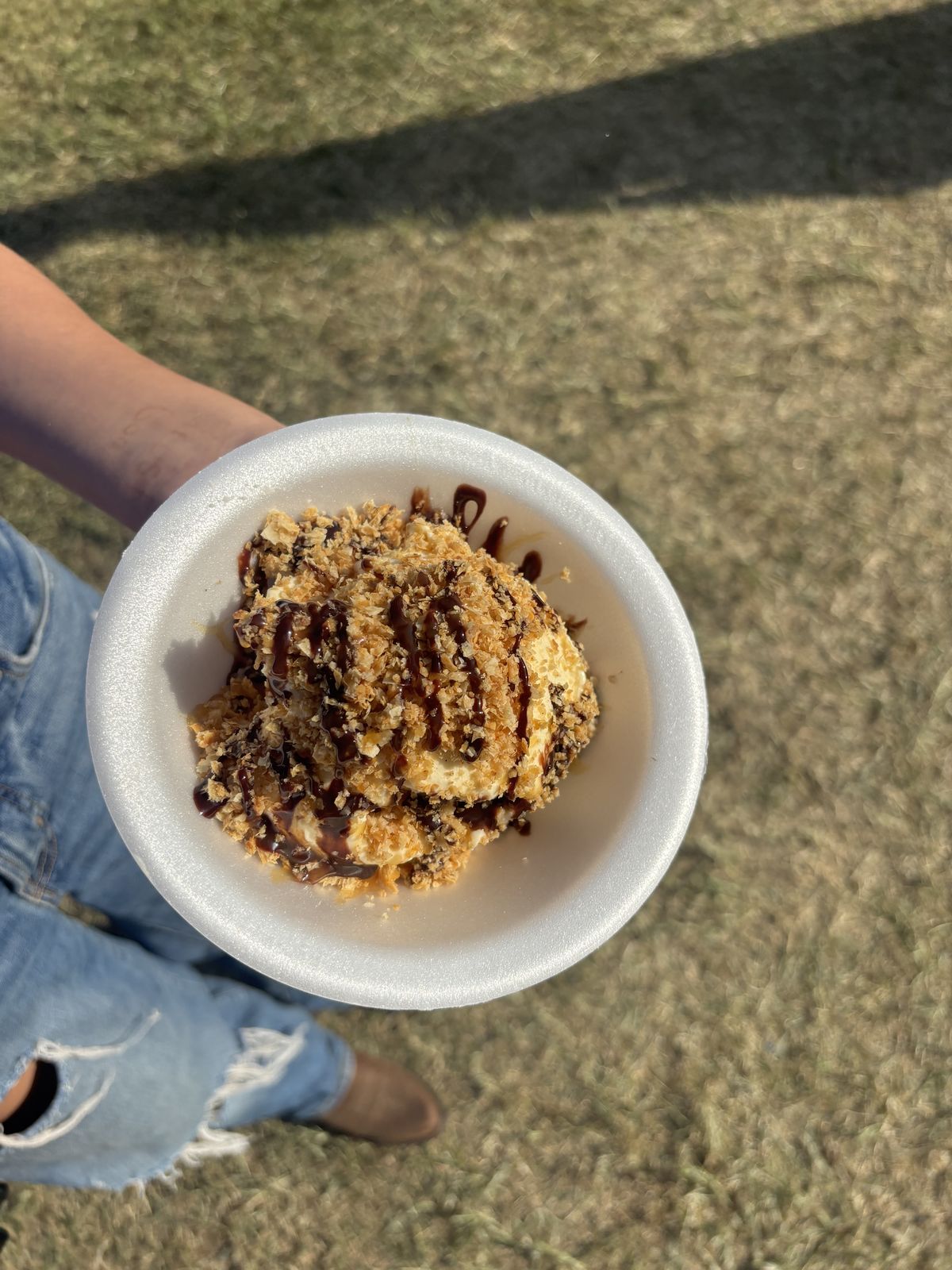 Baklava sundae with ice cream, phyllo crumbs, and chocolate in a cup