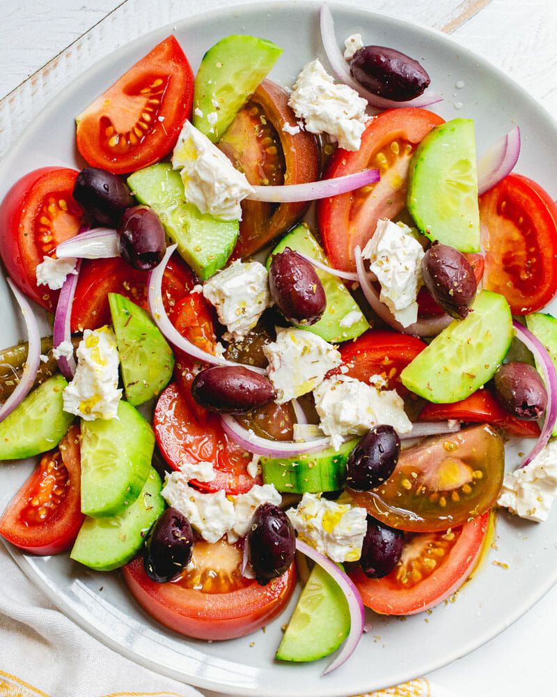 Greek salad with tomato, cucumber, olive, and feta